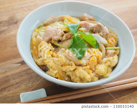 Oyakodon topped with mitsuba (Japanese parsley) Oyakodon topped with mitsuba (Japanese parsley) 138033140