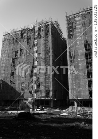 desolate black and white construction high-rise buildings desolate black and white construction high-rise buildings 138033229