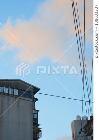 Tilt-shift photography, rooftop wires, blue sky Tilt-shift photography, rooftop wires, blue sky 138033237