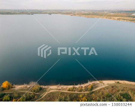 Windy Lake in Germany - Drone Aerial View Neuseenland Zwenkauer See Green Trees and Waves on Water Windy Lake in Germany - Drone Aerial View Neuseenland Zwenkauer See Green Trees and Waves on Water 138033244