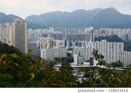 Residential area under the Lion Rock Mountain, Hong Kong Residential area under the Lion Rock Mountain, Hong Kong 138033428