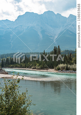 The majestic mountains of Canmore and the emerald Bow River The majestic mountains of Canmore and the emerald Bow River 138033688