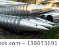 Stack of galvanized screw piles for house foundation 138033691