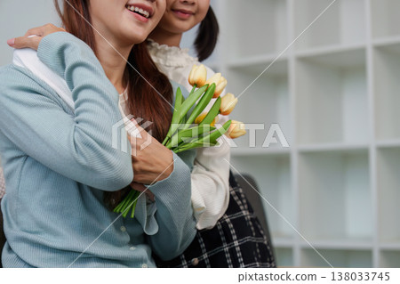 Woman receiving tulips in a heartfelt moment Woman receiving tulips in a heartfelt moment 138033745