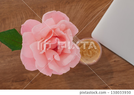 symbol of work-life balance: overhead view of coffee, flower, and technology on a desk symbol of work-life balance: overhead view of coffee, flower, and technology on a desk 138033930