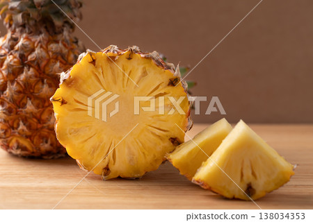 Slices and half of fresh ripe pineapple, Tropical summer fruit 138034353