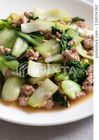 Stir-fried bok choy and minced pork with soy sauce (Thai food) on white plate Stir-fried bok choy and minced pork with soy sauce (Thai food) on white plate 138034362