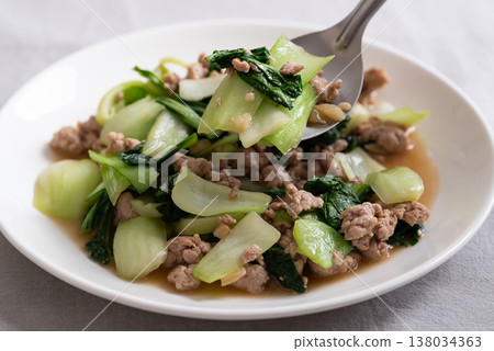 Stir-fried bok choy and minced pork with soy sauce (Thai food) on white plate Stir-fried bok choy and minced pork with soy sauce (Thai food) on white plate 138034363