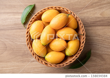 Fresh Marian plum (Mayongchid), Thai tropical fruit in summer season, Table top view 138034384