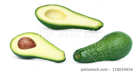 Set of ripe fresh whole and halved avocados isolated. Whole avocado, cut in a half of avocado with pit and half of avocado without seed. Set of ripe fresh whole and halved avocados isolated. Whole avocado, cut in a half of avocado with pit and half of avocado without seed. 138034654
