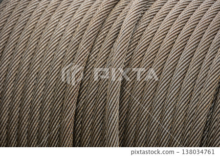 High strength metal sling rope, steel twist string cable for heavy industry closeup High strength metal sling rope, steel twist string cable for heavy industry closeup 138034761