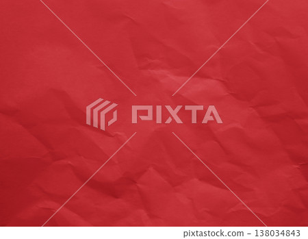 A close-up of bright red paper with prominent folds and shadows. A close-up of bright red paper with prominent folds and shadows. 138034843