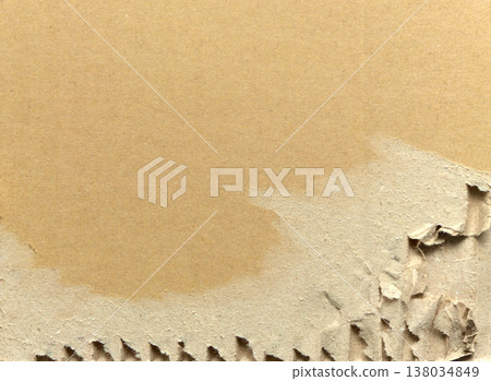 Cardboard background texture with a torn surface Cardboard background texture with a torn surface 138034849