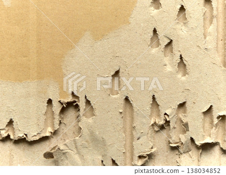 Cardboard background texture with a torn surface Cardboard background texture with a torn surface 138034852