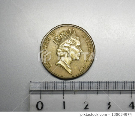 A one-dollar coin issued in Australia in 1985. 138034974