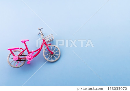 World Bicycle Day. Bicycle isolated on sky blue background. Copy space. Environment preserve. World Bicycle Day. Bicycle isolated on sky blue background. Copy space. Environment preserve. 138035070