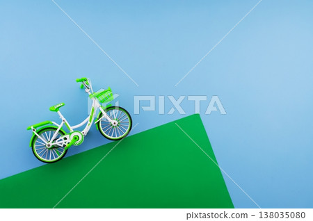 World Bicycle Day. Bicycle isolated on sky blue background. Copy space. Environment preserve. World Bicycle Day. Bicycle isolated on sky blue background. Copy space. Environment preserve. 138035080