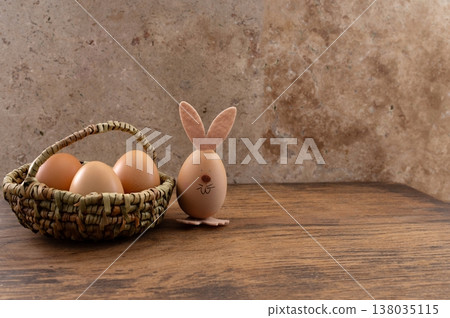 Easter eggs decorated with natural materials, travertine plate and background. 138035115