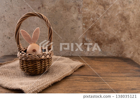 Easter eggs decorated with natural materials, travertine plate and background. 138035121