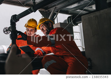Two professional engineer male teamwork service maintenance, Worker industry water pipe tube system Two professional engineer male teamwork service maintenance, Worker industry water pipe tube system 138035343