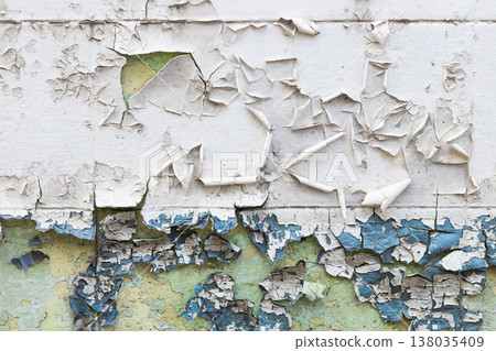 Crack peeling paint on old vintage poor wall grunge dirty ruin damage outdoor color painting Crack peeling paint on old vintage poor wall grunge dirty ruin damage outdoor color painting 138035409