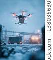 Drone delivering package over snowy industrial landscape with cargo containers and vehicles 138035630