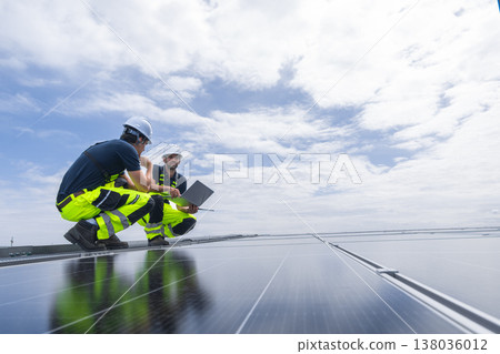 Professional Engineer Team Service Solar Panel. Worker Maintenance Cleaning Replacing Solar Panel. Professional Engineer Team Service Solar Panel. Worker Maintenance Cleaning Replacing Solar Panel. 138036012