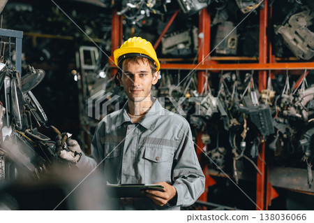 portrait young Caucasian technician worker working in heavy industry, looking camera happy smiling 138036066