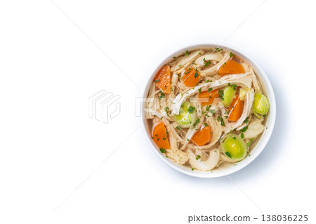 Homemade chicken soup in white bowl with carrots and celery 138036225