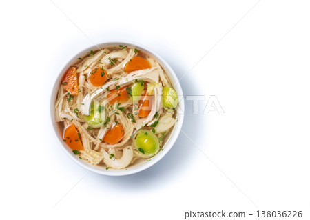 Homemade chicken soup in white bowl with carrots and celery Homemade chicken soup in white bowl with carrots and celery 138036226