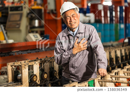 Senior factory worker chest pain suffering from heart attack, heart fail sign expression at work 138036349