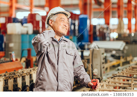 Senior worker tired exhausted muscle pain, Suffering neck pain from hard work in heavy industry Senior worker tired exhausted muscle pain, Suffering neck pain from hard work in heavy industry 138036353