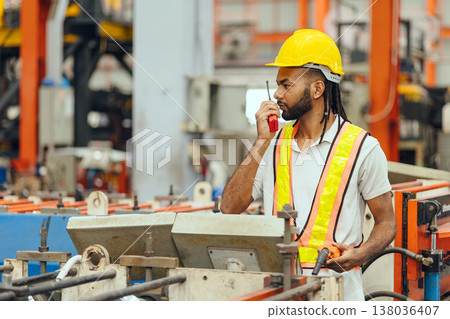 Professional African black worker working machine operator in heavy industry factory supervisor Professional African black worker working machine operator in heavy industry factory supervisor 138036407