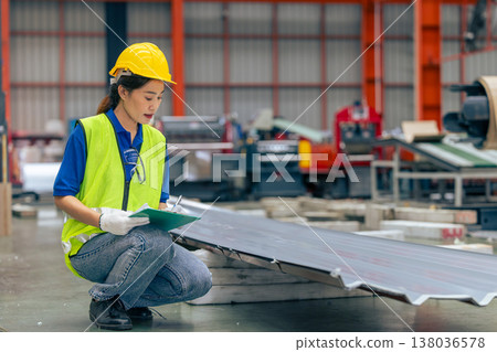 Asian woman engineer worker, professional employee working in metal sheet plant factory Asian woman engineer worker, professional employee working in metal sheet plant factory 138036578