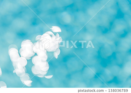Abstract swimming pool with blurred water surface, sunshine reflections, dreamy artistic vacation background 138036789
