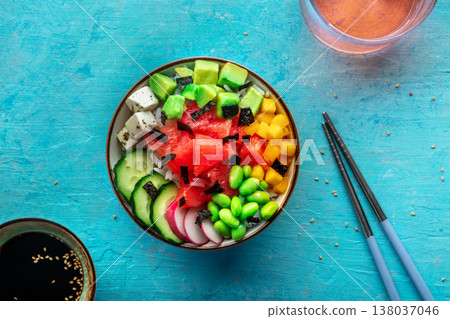 Vegan poke bowl with grapefruit, avocado, mango, edamame, overhead shot Vegan poke bowl with grapefruit, avocado, mango, edamame, overhead shot 138037046