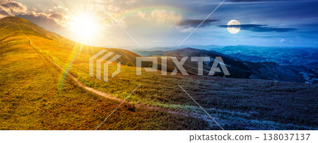 panorama of a beautiful autumn equinox landscape. day meet night. sun and moon over mountain path through the grassy alpine meadow turns uphill to the sky. distant rolling hills. remote vista panorama of a beautiful autumn equinox landscape. day meet night. sun and moon over mountain path through the grassy alpine meadow turns uphill to the sky. distant rolling hills. remote vista 138037137