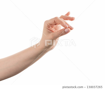 Young woman hand holding something with fingers isolated on white background Young woman hand holding something with fingers isolated on white background 138037265