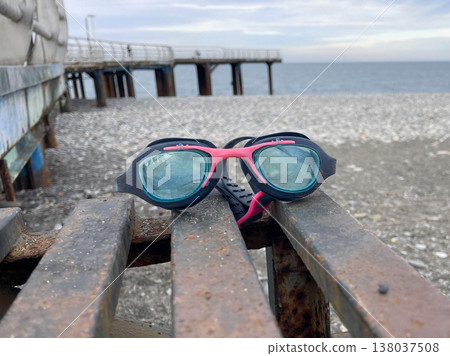 a glasses for swimming near the beach 138037508