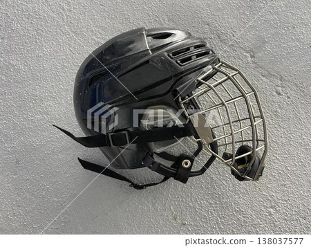 gockey helmet on the gray background gockey helmet on the gray background 138037577