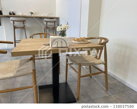 the pancake plate is on the right on the table 138037580