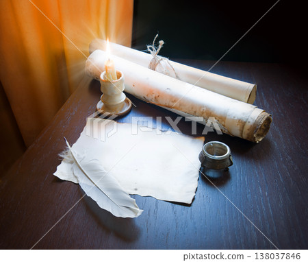 Paper and quill on the table 138037846