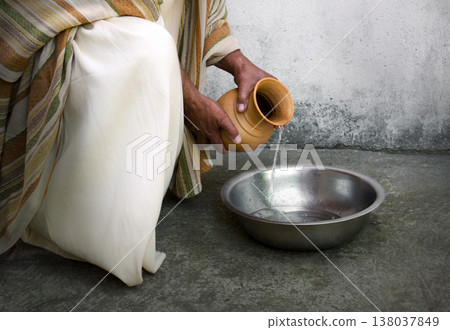 Man pour water into bowl 138037849