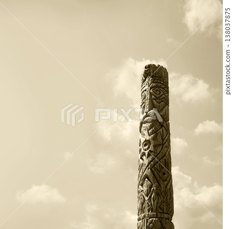 Old wooden idol in the field Old wooden idol in the field 138037875
