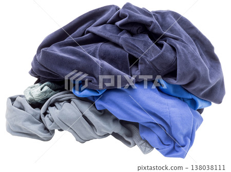 A collection of wrinkled clothes sits in a messy pile, showing various colors and fabrics. This scene suggests it is time for sorting and washing the laundry A collection of wrinkled clothes sits in a messy pile, showing various colors and fabrics. This scene suggests it is time for sorting and washing the laundry 138038111