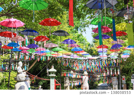Colorful umbrellas hanging at the Mitsui-dera Wind Chime Festival in Tagawa City, Fukuoka Prefecture 138038553