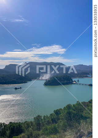 Scenic Guadalhorce reservoirs filled to the brim with water creating breathtaking natural landscape in Spain. Scenic Guadalhorce reservoirs filled to the brim with water creating breathtaking natural landscape in Spain. 138038935