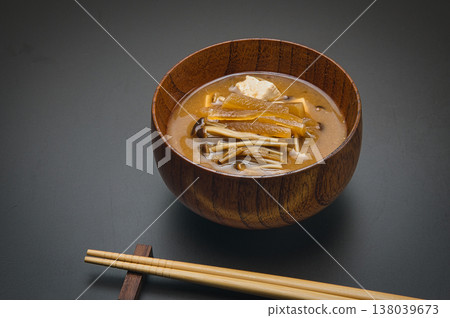 A delicious miso soup made with brown, original enoki mushrooms and red miso. A delicious miso soup made with brown, original enoki mushrooms and red miso. 138039673