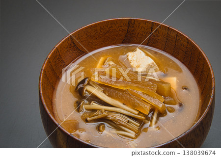 A delicious miso soup made with brown, original enoki mushrooms and red miso. 138039674