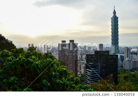 Aerial view of skyline of Taipei city with Taipei 101 Skyscraper at sunset from Xiangshan Elephant Mountain. Beautiful landscape and cityscape of Taipei downtown buildings and architecture in the city Aerial view of skyline of Taipei city with Taipei 101 Skyscraper at sunset from Xiangshan Elephant Mountain. Beautiful landscape and cityscape of Taipei downtown buildings and architecture in the city 138040058